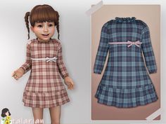 the doll is wearing a plaid dress with a pink bow around her neck and hair in pigtails