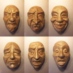 six masks with different facial expressions on them