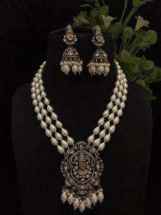 Very Gorgeous and elegant Cz stone Necklace with Matching  Earrings Versatile. Can be  paired with number of outfits. Perfect to wear at weddings occasions. Highest quality and craftsmanship Please let me know if you have any questions Temple Jewelry Chandbali Pearl Necklace For Party, Elegant Kundan Jeweled Temple Necklace, Silver Pearl Chandbali Necklace With Meenakari, Ornate Kundan Necklace With Stone Work For Celebrations, Elegant Jeweled Kundan Temple Necklace, Festive Temple Jewelry Necklace With American Diamond, Elegant Silver Jeweled Temple Necklace, Elegant Jeweled Silver Temple Necklace, Festival Chandbali American Diamond Necklaces