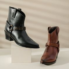 This black leather handcrafted ankle boot features a Stitched vamp, pointy toe, , metal studded strap with metallic silver O-ring, both side leather pull tabs for easy on/off, and low, stacked heel for all-day walkable comfort. Upper - Leather Lining - Leather Insole - Leather Closure - Slip On With Both side Pull tabs Sole - Tunit Heel Height - 5.08 cm (2.0 Inches) Leather Moto Boots With Silver Studs For Fall, Leather Moto Boots With Spikes And Pointed Toe, Spiked Leather Moto Boots With Pointed Toe, Studded Leather Moto Boots With Pointed Toe, High Ankle Studded Leather Boots, Leather Boots With Silver Studs And Pointed Toe, Pointed Toe Leather Boots With Silver Studs, Silver Studded Leather Boots With Pointed Toe, Black Studded High Ankle Boots