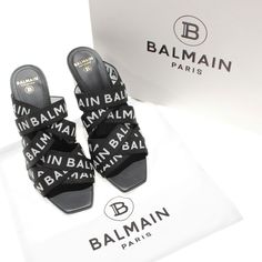 Balmain Black Chic Logo Sandals For Summer, Chic Summer Sandals With Logo, Designer Black Sandals With Logo Strap, Black Designer Sandals With Logo, Black Logo Sandals For Summer, Black Sandals With Logo Strap For Summer, Modern Sandals With Logo For Summer, Modern Logo Sandals For Summer, Balmain Shoes