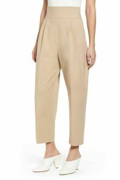 Topshop High Waisted Khaki Pants with Lace-up at back Size: US 12, UK 16, Euro 44.  (See measurements below ) Condition:  New without tags Color: Camel -Classic tan Made In Romania Measurements: Waist measures 17.5”, flat across front  front rise: 15” Back rise: 18.5” Inseam: 26 inches Circumference at hem: 16” Unassuming trousers defined to challenge prim workweek: sharp front pleats  lace up like a corset at the back of the ultra-high waist Side zip  Hook &am Womens Wide Leg Pants, Tan Pants, Lace Back, Cotton Pants, Pants Trousers, Fashion Pants, Trousers Women, Wide Leg Pants, Harem Pants