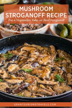 mushroom stroganoni recipe in a skillet with text overlay that reads mushroom stroganoni recipe for a vegetarian take on beef stroganoni