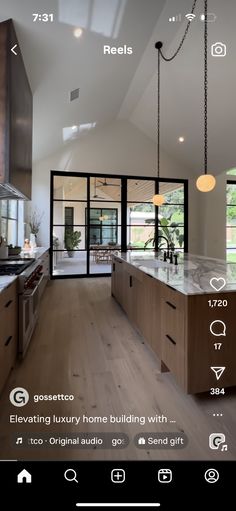 an image of a kitchen with wood floors and white counter tops on the phone screen