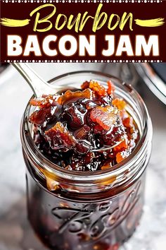 bacon jam in a glass jar with a spoon on the side that says bourbon bacon jam