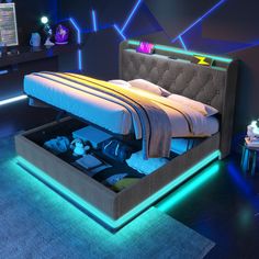 a bed that is in the middle of a room with blue lights on the walls