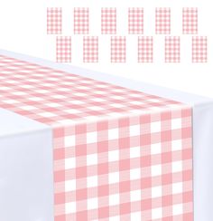 a pink and white checkered table cloth