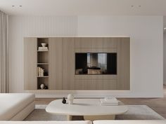 a modern living room with white furniture and minimalist decor