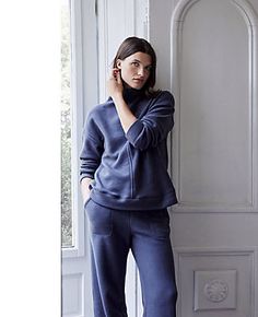 Experience the epitome of comfort with the Ann Taylor Haven Well Within Comfort Fleece Funnel Neck Pullover. Designed for those cherished moments of relaxation, this pullover is a must-have for your wardrobe.

- **Size:** Small
- **Color:** Ombre-Blue (appears navy as pictured)
- **Material:** 50% Organically Grown Cotton, 33% Recycled Polyester, 17% Nylon
- **Fit:** Relaxed fit
- **Length:** 24" long
- **Sleeve Type:** Long sleeves
- **Care Instructions:** Machine washable

Crafted with a blend Blue Funnel Neck Top With Ribbed Cuffs, Blue French Terry Long Sleeve Tops, Blue Funnel Neck Sweater With Ribbed Cuffs, Vince Blue Cashmere Funnel Neck Sweater, Cozy Blue V-neck Outerwear, Hip Style, Knitted Suit, Leisure Time, Blue Ombre