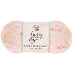 baby bee soft & sleek baby yarn in pink and white, with the label on it