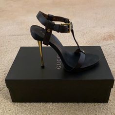 Brand New In Original Box Size 36 “Kylie“ Dark Brown Leather With Black Wooden Sole And Gold Stiletto Heel Approximate Heel Height Is 4 Inches Includes Heel Replacements And Gucci Dust Bag Jlo Was Seen Recently Wearing A Similar Pair Luxury Brown Heels With Heel Strap, Chic Gucci High Heels, Gucci Ankle Strap Leather Heels, Gucci Brown High Heel Heels, Chic Gucci Heels With Reinforced Heel, Gucci Brown High Heels, Gucci High Heels For Night Out, Chic Brown Gucci Heels, Modern Formal Gucci Heels