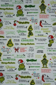 a white christmas fabric with green and red designs on it, including the words for holiday cookies