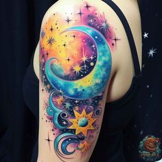 a woman's arm with a colorful tattoo on it and stars in the sky