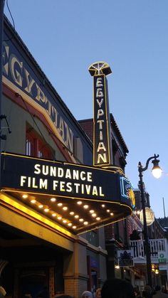 a large sign on the side of a building that says sundanance film festival