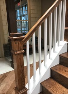 there is a wooden stair case in the house