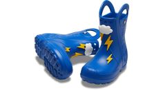 Now kids can enjoy classic Crocs comfort — even on the rainiest days. This kids’ rain boot with a waterproof build keeps puddle-jumping feet cozy and dry. Plus, oversized handles make them easy for kids to put on and take off. This version features a fixed lightning bolt design with squishy EVA clouds.  Kids’ Handle It Lightning Bolt Rain Boot Details:    • Fixed lightning bolt design with squishy EVA clouds  • Waterproof rain boot  • Large handles for easy on and off  • Reflective heel logos  • Puddle Jumping, Lightning Bolt Design, Classic Crocs, Kids Rain, Rain Boot, Lightning Bolt, Rainy Day, Put On, Rain Boots