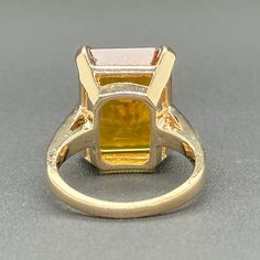 FREE Ring Sizing on this item. Up or Down up to 2 full sizes are complimentary on the purchase of this Ring. Simply request size adjustment in buyer notes._____________________________________________________________________________ This Estate 14K Yellow Gold 8.87ct Citrine Cocktail Ring will be the bee's knees of your jewelry box! Everything from it's eye-clean 8.87ct emerald cut citrine to the luxurious 14K yellow gold will have your friends green with envy. And, with a size 6 design that can Gia Certified Square Cut Gold Ring, Gold Square Cut Gia Certified Ring, Sapphire Cocktail Ring, Bee's Knees, Green With Envy, Orange Sapphire, Cocktail Ring, Cocktail Rings, Emerald Cut