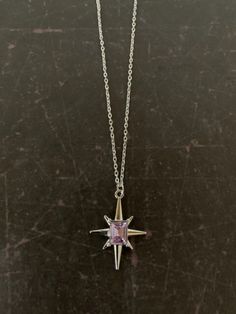 "Lovely silver tone 8 point star necklace with center emerald cut lilac stone, star necklace silver, 8 point star pendant, lilac stone necklace, heather necklace, star gift Pendant measures 1\" L X 7/8\" W and is on an 18\" chain.   ★ Want to see more?  Please visit my shop at: https://www.etsy.com/shop/DesignsByPeg" Cheap Purple Star-shaped Jewelry, Dainty Silver Starburst Jewelry, Nickel-free Starburst Jewelry As Gift, Nickel-free Starburst Jewelry For Gift, 8 Point Star, Lilac Stone, Space Necklace, Christmas Watches, Star Necklace Silver