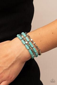 A mismatched assortment of dainty silver beads, turquoise stone discs, and faceted silver accents are threaded along stretchy bands, creating earthy layers around the wrist.

 Sold as one set of four bracelets. Squirrel Jewelry, Blue Stone Bracelet, Bracelet Display, Jewelry Images, Earring Display, Paparazzi Accessories, Paparazzi Jewelry, Blue Bracelet, White Stone