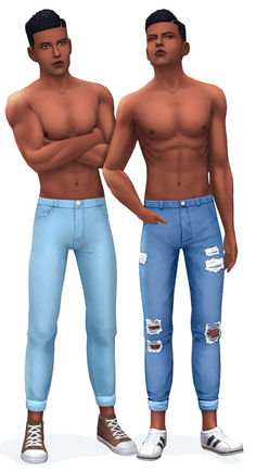 two men standing next to each other wearing ripped jeans