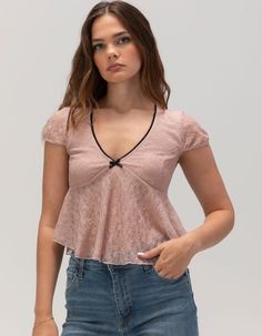 Full Tilt Lace V-Neck Top. Delicate Sheer Lace Top. Double Lined Bodice For Privacy. Short Sleeves. Contrast Picot Trim V-Neckline. Cropped Length. Self: 92% Polyester, 8% Spandex. Lining: 100% Polyester. Hand Wash. Imported.model Is Wearing A Size Small. Model Measurements:height: 5'9" Bust: 32"waist: 25"hips: 35" Model Is Wearing A Size Small. Model Measurements:height: 5'8" Bust: 31"waist: 23.5"hips: 34.5" Wwe T Shirts, Flannel Sweatshirt, Sheer Lace Top, Graphic Trends, Full Tilt, Square Neck Top, Girls Blouse, Printed Denim, Puff Sleeve Top