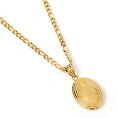 Our Classic Locket Necklace is here to melt hearts with memories! The perfect gift for sentimental value, this gorgeous pendant has an easy open and close feature so you can insert a picture and cherish memories for a lifetime! 14k Gold (1 Micron Plating)  Stainless Steel Base  E-coating for a premium finish  Lead & Nickel Free  Tarnish-Free  Water Resistant Elegant Locket Necklace With Charms For Anniversary, Oval Charms Jewelry For Keepsake, Elegant Medallion Locket Necklace With Charms, Medallion Necklaces With Detachable Pendant For Keepsake, Keepsake Medallion Necklace With Detachable Pendant, Elegant Keepsake Jewelry With Charms, Oval Keepsake Jewelry With Charms, Keepsake Oval Charms Jewelry, Elegant Keepsake Charms Jewelry