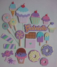 there are many different types of cupcakes and donuts on this wall decoration