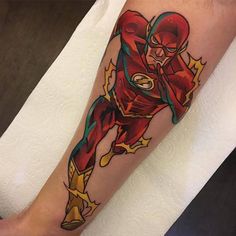 a flash tattoo on the leg of a person