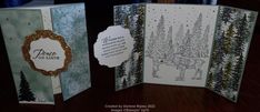 two handmade greeting cards on a table with trees and snowflakes in the background