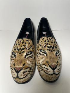 Introducing the BY PAIGE Big Cat needlepoint classic flats loafers, perfect for casual or workwear occasions. These slip-on shoes feature a low top shoe shaft style with a round toe shape and a block heel style. The upper material is made of needlepoint fabric with a black color and animal print pattern, giving them a unique and stylish look. The shoes are handmade and are size 10. New with out box. Cat Needlepoint, Animal Print Pattern, Animal Prints Pattern, Big Cat, Big Cats, Top Shoes, Print Pattern, Slip On Shoes, Comfortable Shoes