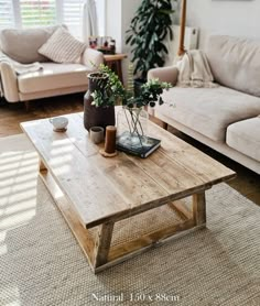 a living room with two couches and a coffee table