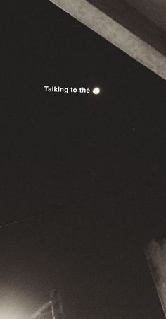 a black and white photo with the words talking to the moon in it's center