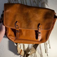 This Is A Rare Find, Genuine Leather Dooney Bag, In Great Condition Save For A Few Scuffs On The Suede Leather. Genuine Dooney And Bourke, No Dust, Been Storing In A Dust Bag To Keep It Clean. Originally Paid Nearly $700 For This Bag. Classic Tan Satchel With Leather Handles, Designer Saddle Bag With Leather Lining For Travel, Designer Leather Saddle Bag For Everyday, Designer Leather Camera Bag For Everyday Use, Designer Saddle Bag With Leather Handles For Everyday, Classic Tan Leather Bag, Tan Satchel With Leather Lining For Travel, Classic Leather Satchel Camera Bag, Designer Leather Camera Bag With Adjustable Strap