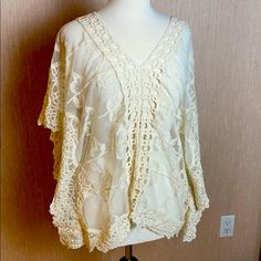 This Sexy, And Very Feminine Soft Lace Top, Decorated With Crochet Detail. Enjoy It With Slacks, Over A Bathing Suit, Or With A Sexy Tight Pair Of Jeans. No Tags, But Never Worn Fitted Beach Blouse With Crochet Trim, Fitted Crochet Lace Blouse For Vacation, Bohemian Lace Crochet Top With Stretch, Bohemian Stretch Lace Crochet Top, Fitted V-neck Lace Top For Vacation, Stretch Lace Top With Crochet Trim, Bohemian Lace Crochet Top For Brunch, Fitted Lace Blouse For Vacation, Summer Stretch Lace Top With V-neck