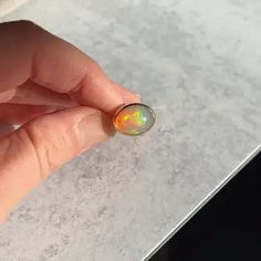 One of a kind STUNNING opal ring. Band and and backplate are solid 18k yellow gold, bezel is 22k solid gold. Incredible, flashy opal. Size 6.5 and cannot be sized. #opalaesthetic Unique Opal Ring, Opal Gold Ring, Gold Opal Ring, Unique Opal, Alternative Bridal, Opal Ring Gold, Opal Ring, Opal Jewelry, Ring Band