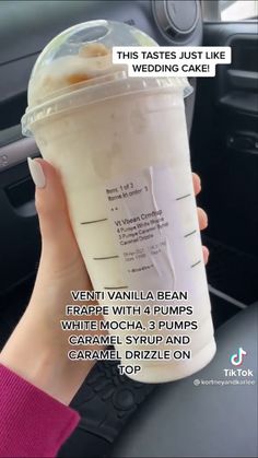 a person holding up a cup with whipped cream in it and the caption reads, this tastes just like wedding cake