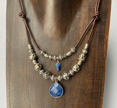 This is a double strand brown leather necklace with silver plated beads and blue sodalite pendants. Brown Leather Necklace, Double Strand Necklace, Blue Sodalite, Bird Necklace, Gifts For My Sister, Multi Strand Necklace, Lariat Necklace, Opal Necklace, Leather Necklace