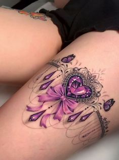 a woman's thigh with purple flowers and butterflies on the side, tattoo style