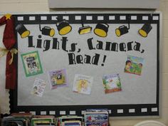 there is a sign on the wall that says lights, camera, read and pictures