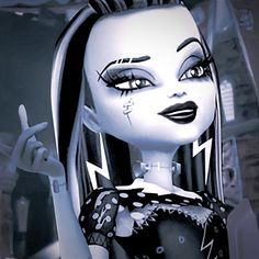 an animated doll with black and white makeup holding a peace sign in front of her face