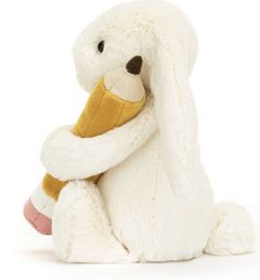 a white stuffed animal with a brown nose and arms wrapped around it's neck