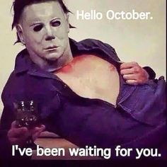 a man wearing a mask and holding a glass in his hand with the caption hello october i've been waiting for you