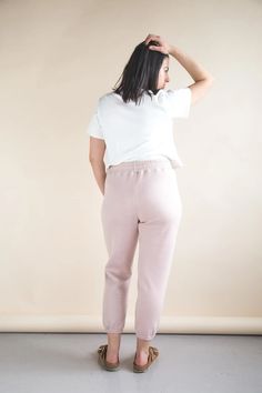 The Plateau Joggers are an elevated take on classic knit jogging pants. With a high rise, unique wrap-around pockets and a comfy elastic waist, they are ideal loungewear at home or on the street. View A is a relaxed fitting pant with an optional drawstring waist and two choices of ankle finish: a fabric cuff or gathered elastic hem. View B is a pair of shorts with a gently scalloped hem. Optional back pockets can be added to either view. Sizes: 0 to 20 New, uncut, paper pattern Athleisure Sweatpants With Ribbed Waistband For Lounging, Athleisure Pants With Comfort Waistband For Loungewear, Athleisure Pants With Elastic Waistband For Lounging, Comfortable Relaxed Fit Sweatpants For Elevated Casual, Relaxed Fit Activewear With Comfort Waistband For Lounging, Sporty Relaxed Fit Sweatpants For Casual Wear, Relaxed Fit Sweatpants With Comfort Waistband For Elevated Casual, Athleisure Pants With Elastic Waistband For Loungewear, Relaxed Fit Athleisure Pants For Loungewear