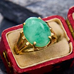 This vintage jadeite cocktail ring is crafted of 14k yellow gold and is currently a size 6. The sleek stone is held aloft on shoulders with a nice cut out open design. Sphere Ring, Lavender Ring, Vintage Jadeite, Beautiful Rings Vintage, Open Design, February Birth Stone, Gold Texture, Amethyst Ring, Cocktail Ring