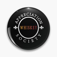 a black button with the words appreciation whiskey society on it's front and side