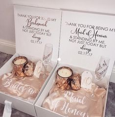 two boxes with wedding gifts in them sitting on the floor next to eachother