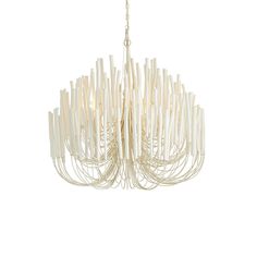 a white chandelier hanging from the ceiling with wooden sticks attached to each light fixture