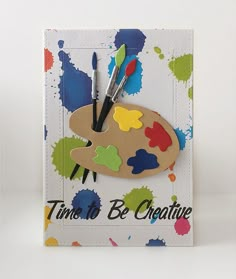 a card with paintbrushes on it and the words time to be creative