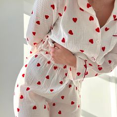 The perfect blend of romance and relaxation Fall in love with the charming heart-patterned design that adorns our Lover's Pajama Women's Loungewear Set. A visual symphony of affection, perfect for cozy nights and lazy mornings. These pajamas aren't just sleepwear; they're a matching ensemble designed for unforgettable moments. The cutest trouser matching pj set. Dive into comfort with the matching pajamas, featuring a trouser pajama that seamlessly combines style and ease. Our Lover's pjs are cr Cotton Pyjama Set, Cute Aesthetic Pajamas, Aesthetic Pj Outfits, Nightsuits For Women, Cute Pjs Aesthetic, Pijama Aesthetic, Pjs Ideas, Heart Pj Set, Pyjamas Aesthetic