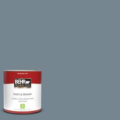 the behr paint and prime in one is light green, with a white base